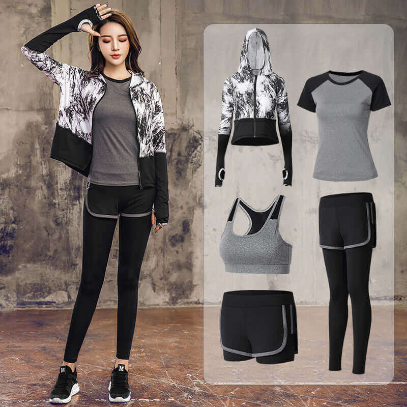Black activewear set for women featuring sports bra, tops, jacket, shorts, and leggings. Stylish and functional for workouts.
