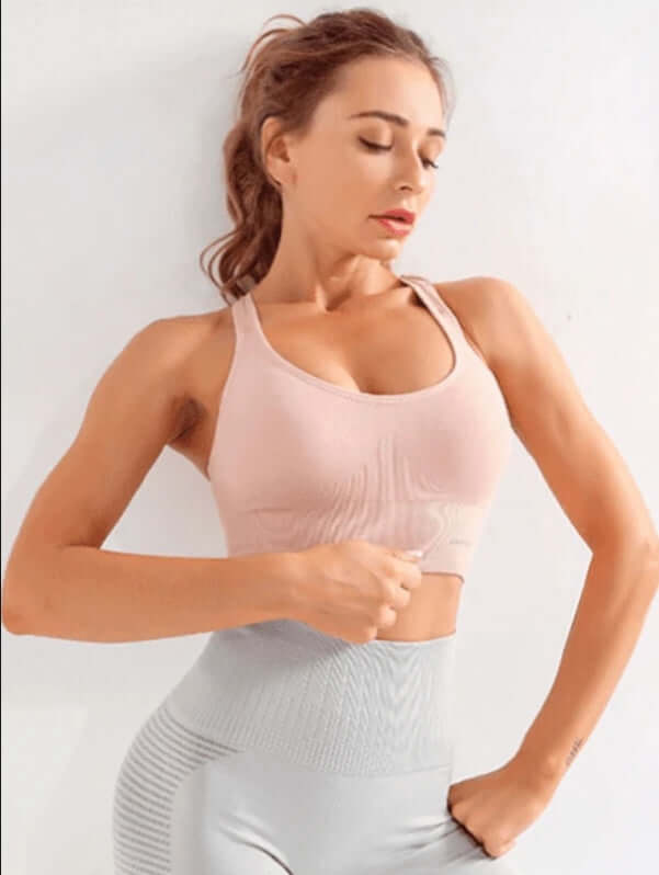 Black Xtreme Sports Bra – Seamless, Open-Back Fit worn during workout for breathability and flexibility