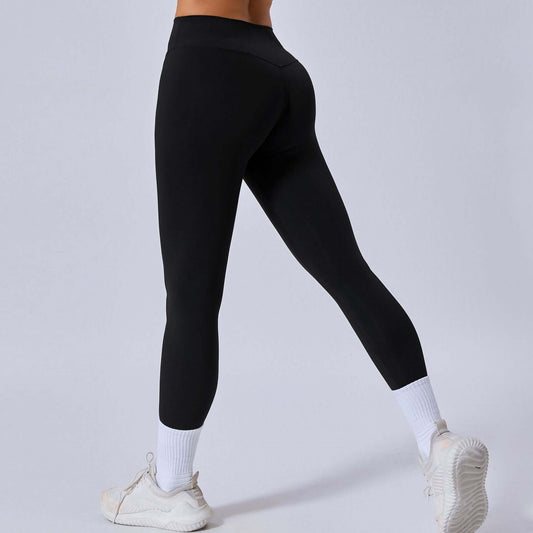 Black Nude Feel Fitness Pants – Quick-Dry, Second-Skin Fit showcased on a model from the back.