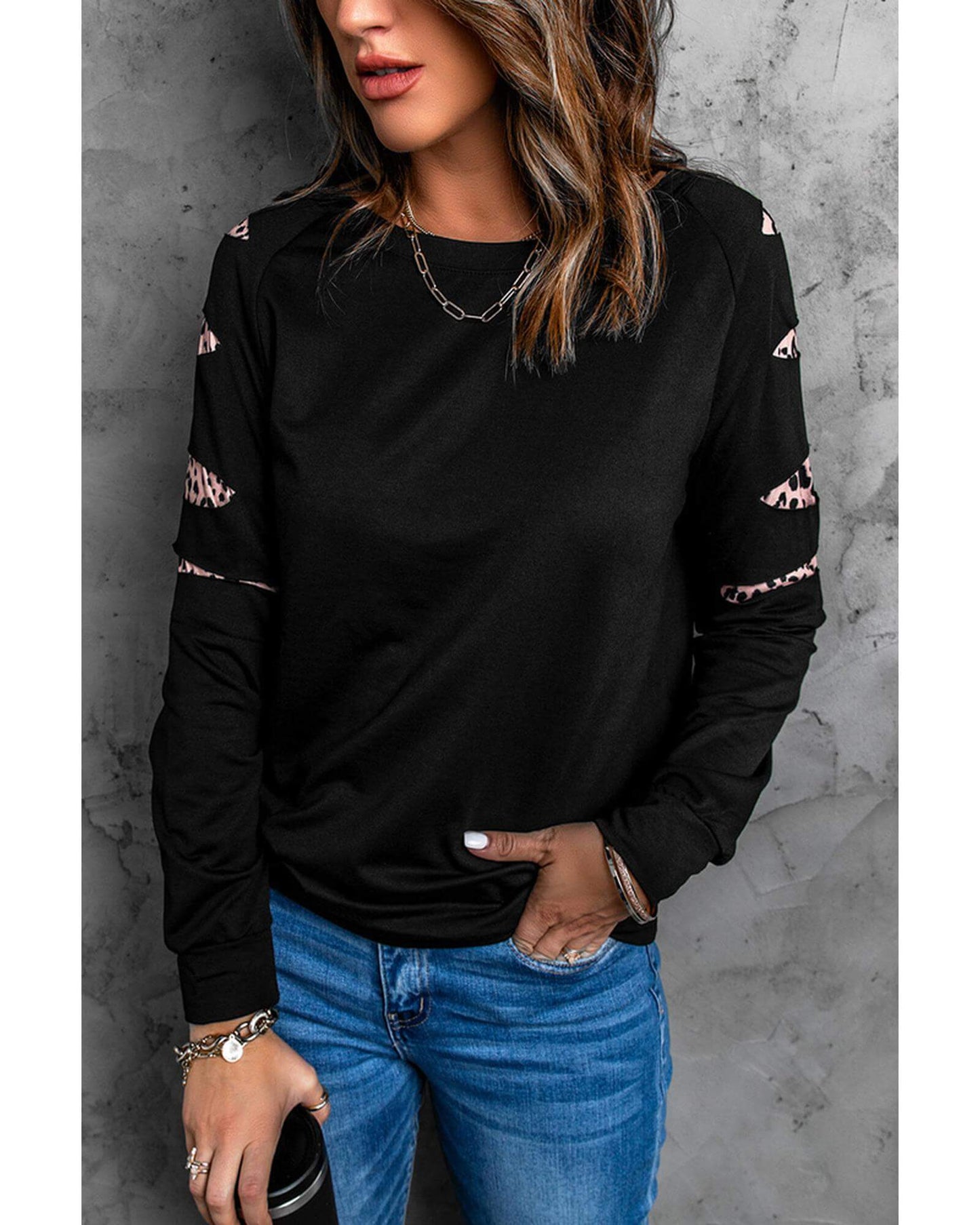 Azura Exchange Black Sweatshirt with stylish detailing, perfect for activewear and adventurous challenges.
