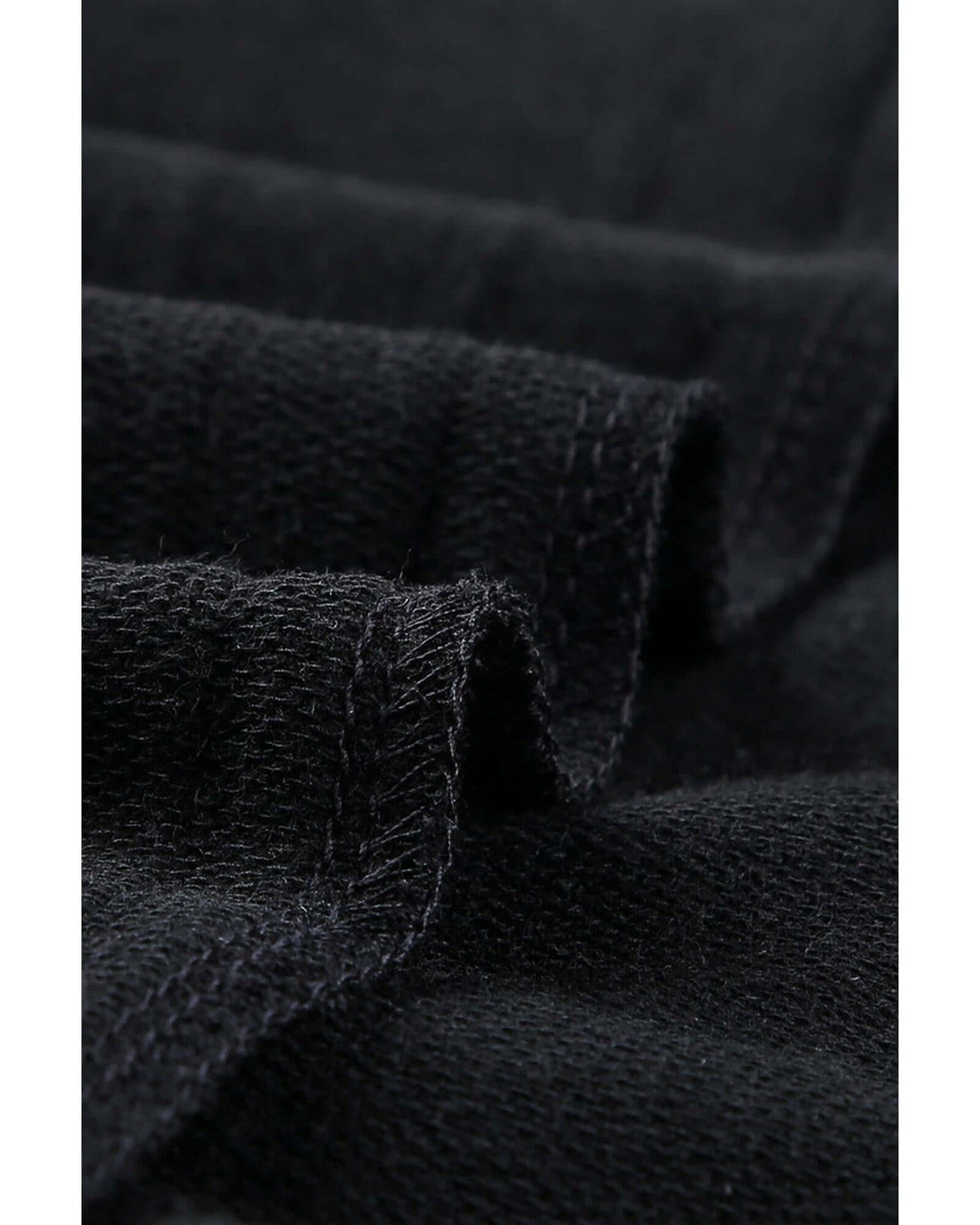 Close-up view of the soft, textured fabric of the Azura Exchange Black Sweatshirt, showcasing its premium quality for activewear.