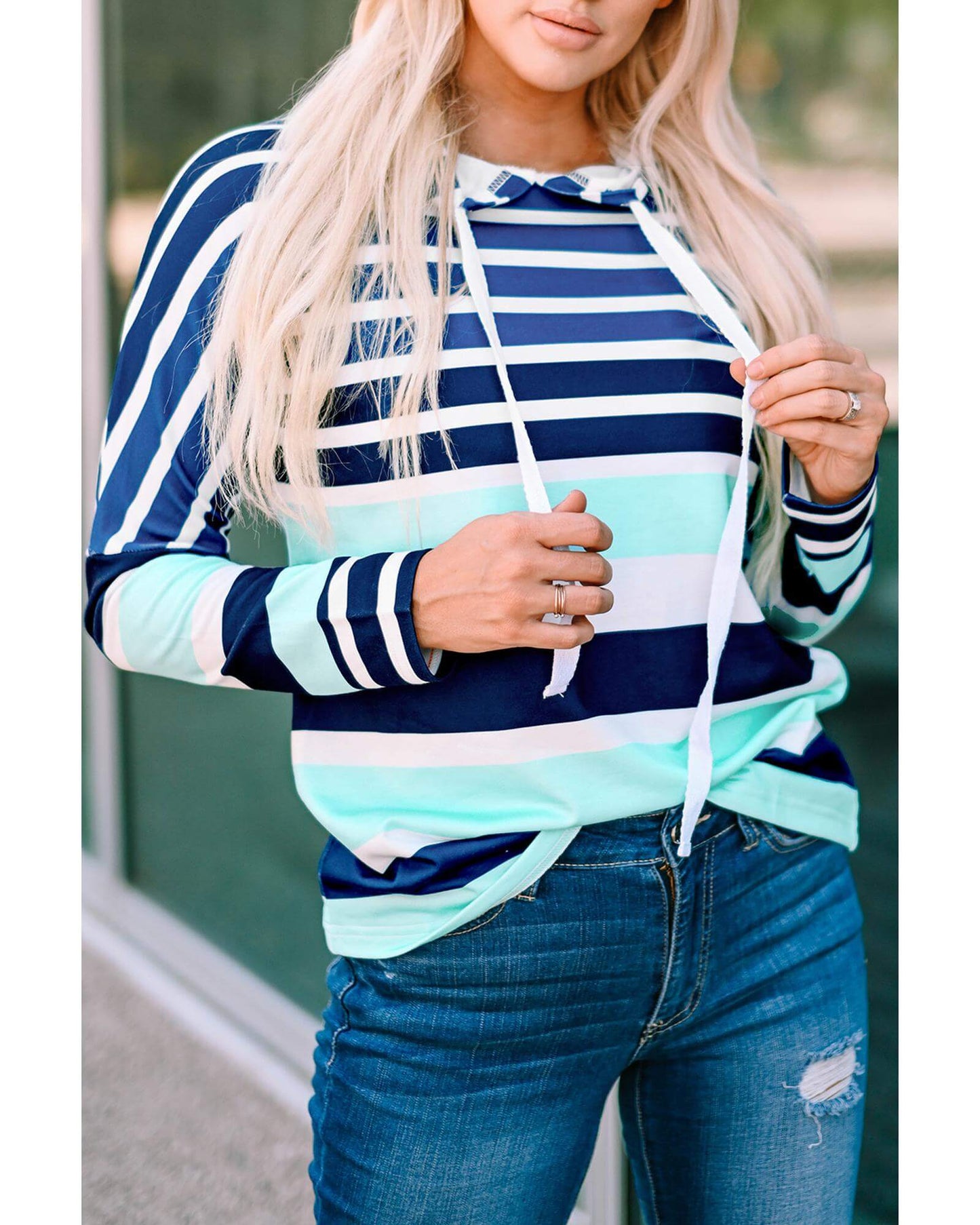 Women's casual Azura Exchange striped drawstring hoodie, featuring vibrant stripes and an adjustable hood.