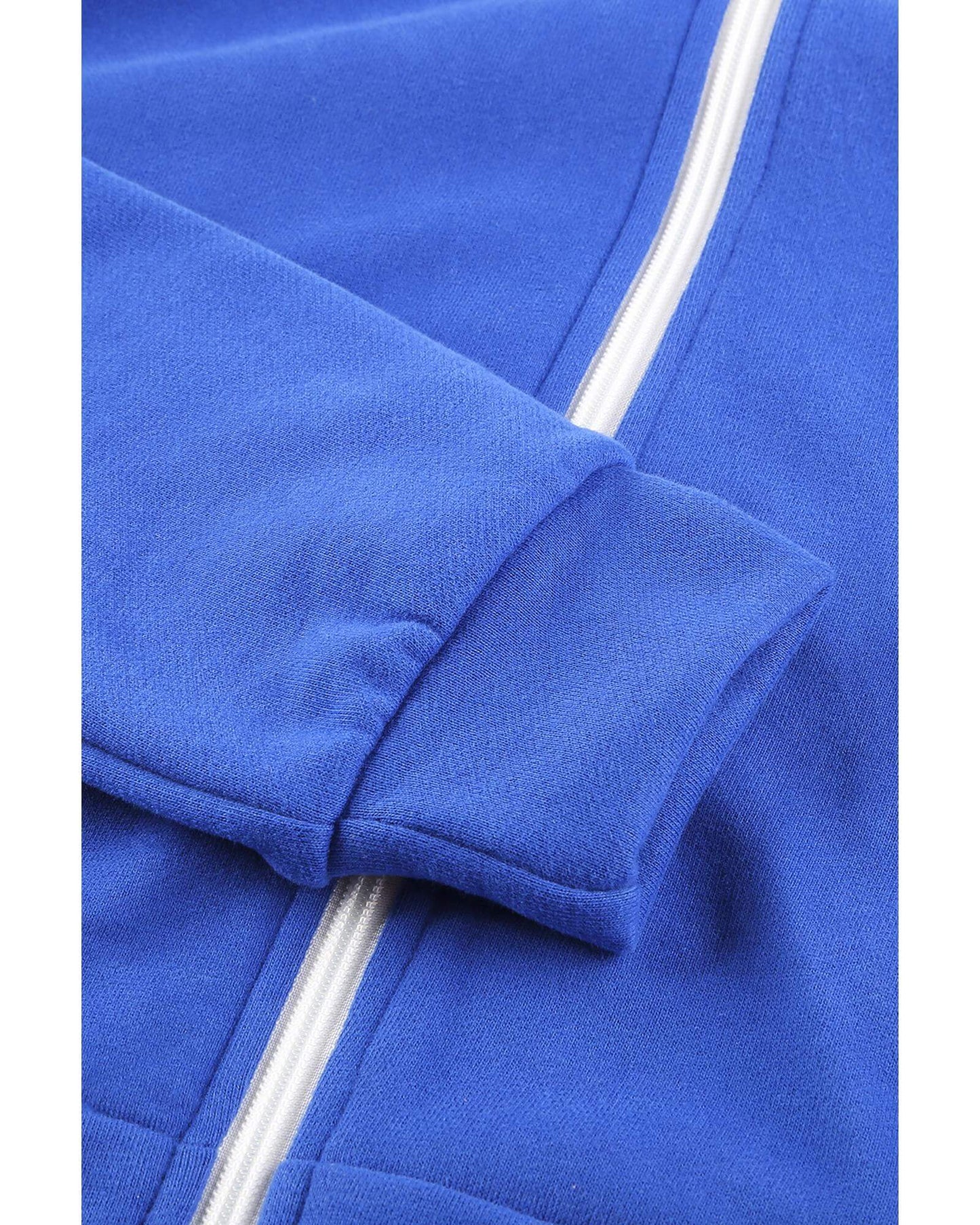 Close-up of Azura Exchange blue zip-up hoodie jacket showcasing cuff detail, perfect for activewear.