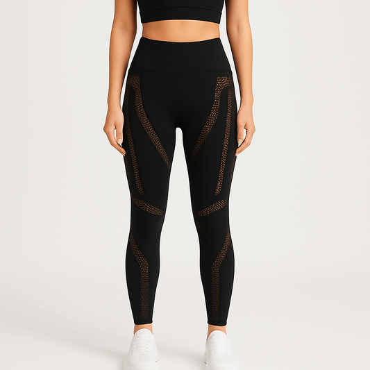 Black Seamless Mesh Yoga Pants – High-Waisted, Breathable Fit worn by model, showcasing stretchy fabric and mesh panels.