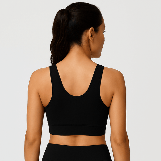 Back view of a woman wearing the Black No-Bounce Sports Bra – Shockproof, Beauty Back Design.