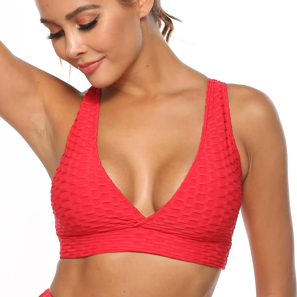 Black Jacquard Sports Bra – Breathable, Stylish Support in vibrant red, showcasing textured fabric and modern design.