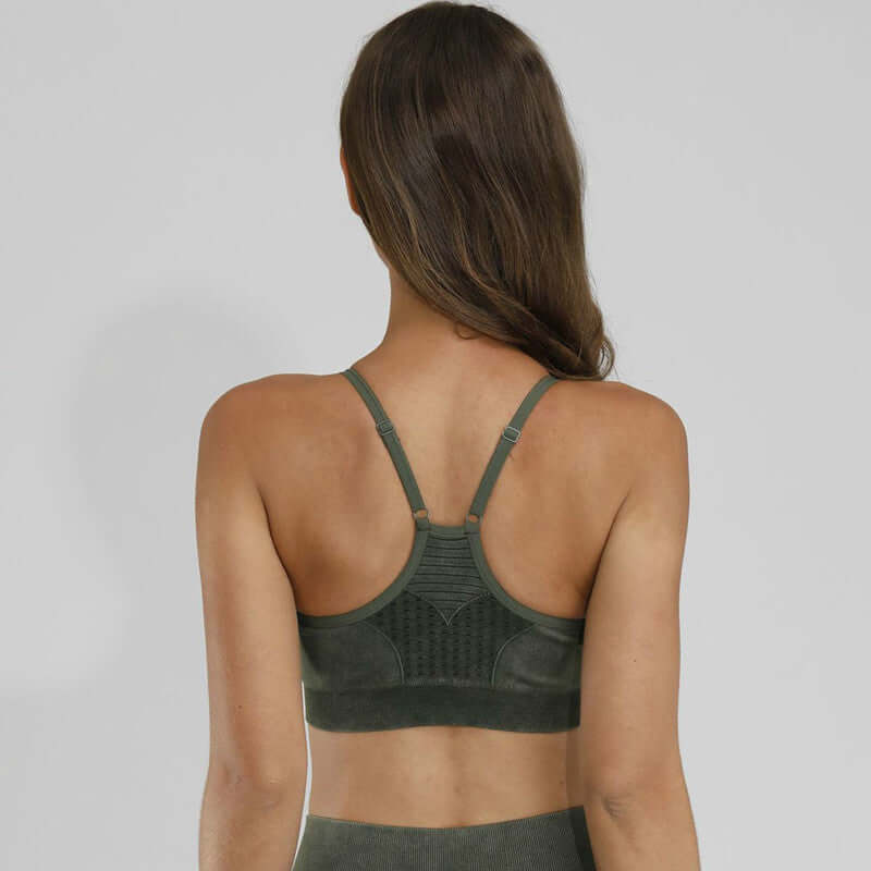Black Xtreme Sports Bra – Seamless, Open-Back Fit shown from the back, highlighting the design and fit.