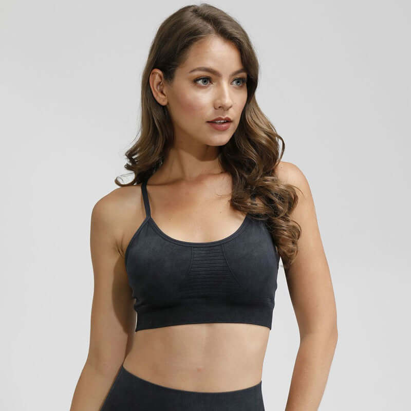 Black Xtreme Sports Bra – Seamless, Open-Back Fit showcasing stylish design and comfort for active lifestyles.