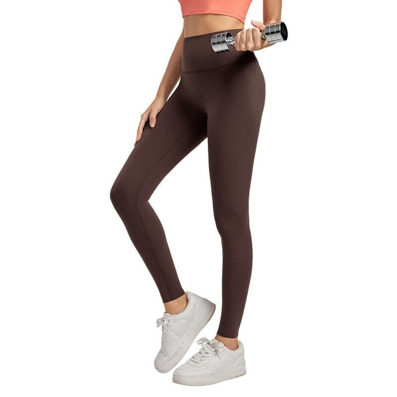 High-Waisted Yoga Pants – Seamless, Sculpting Fit worn by model, showcasing a sculpted silhouette and high-waisted design.