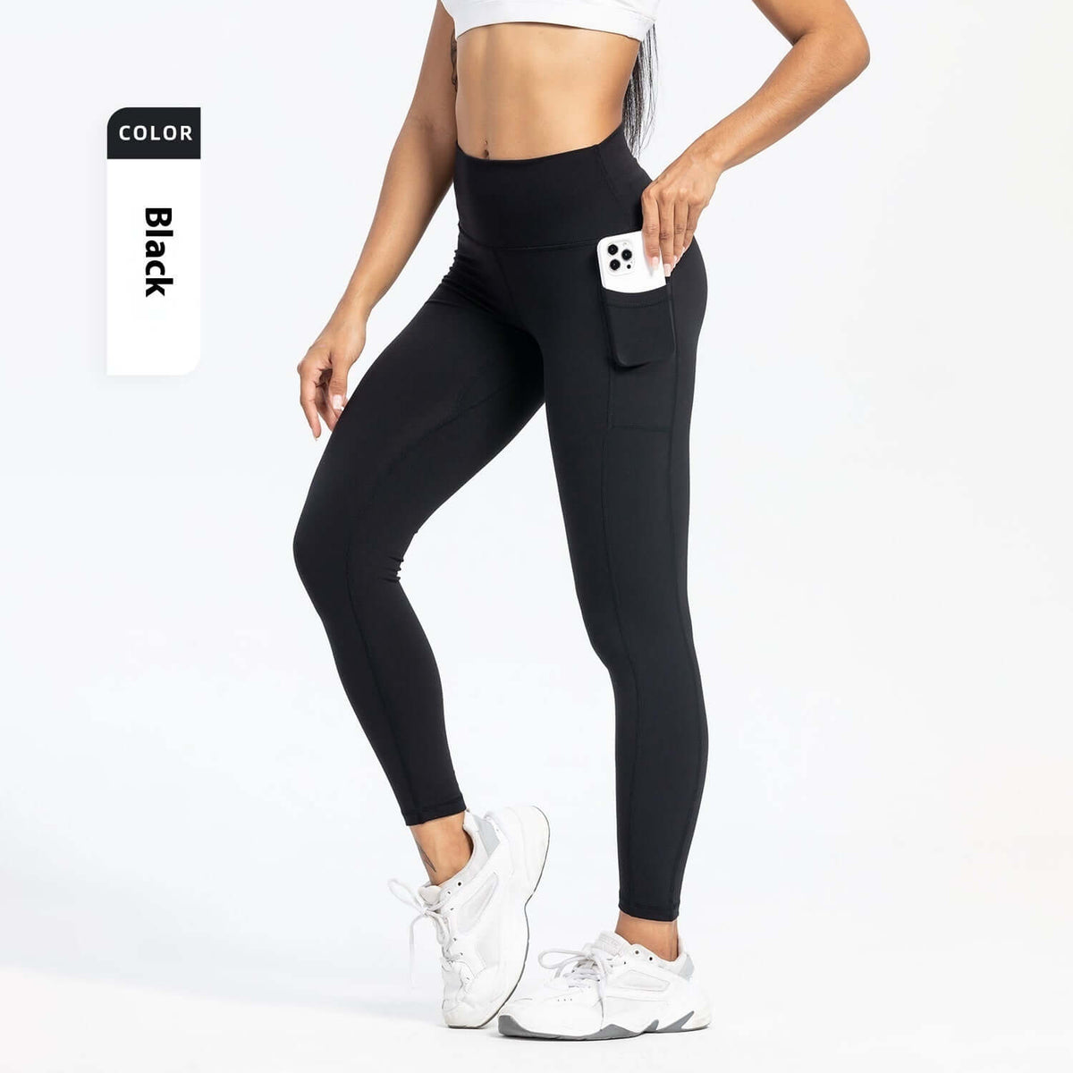 Black Slim-Fit Yoga Pants – High-Waisted with Pockets, featuring pockets and a flattering fit for women.