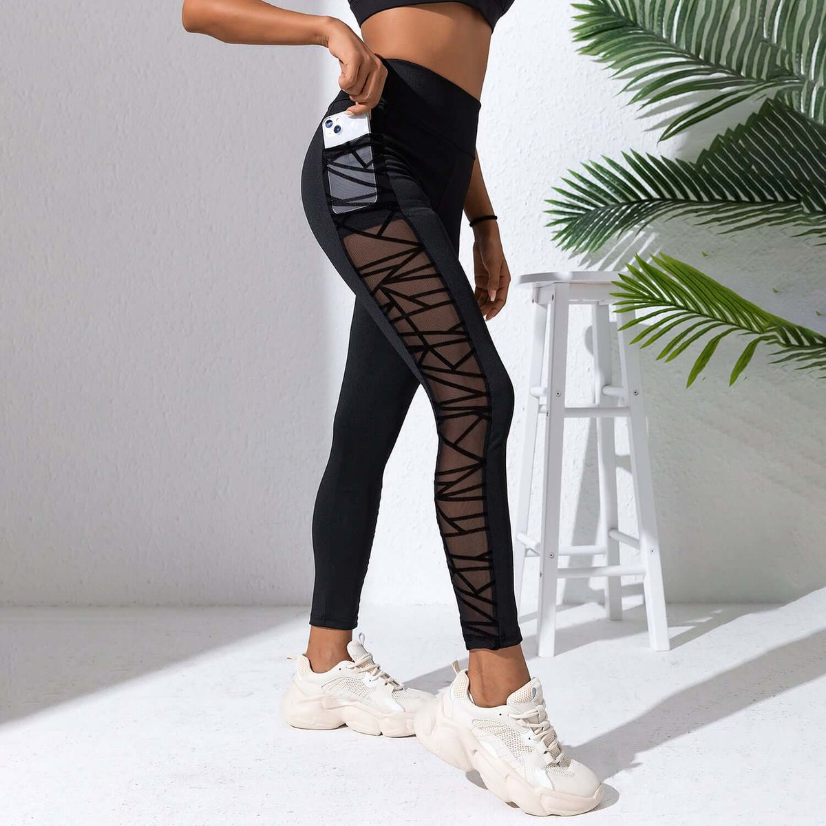 Black Plus Size Compression Leggings – Mesh, Sculpting Fit featuring mesh panels and high-waisted design for women.