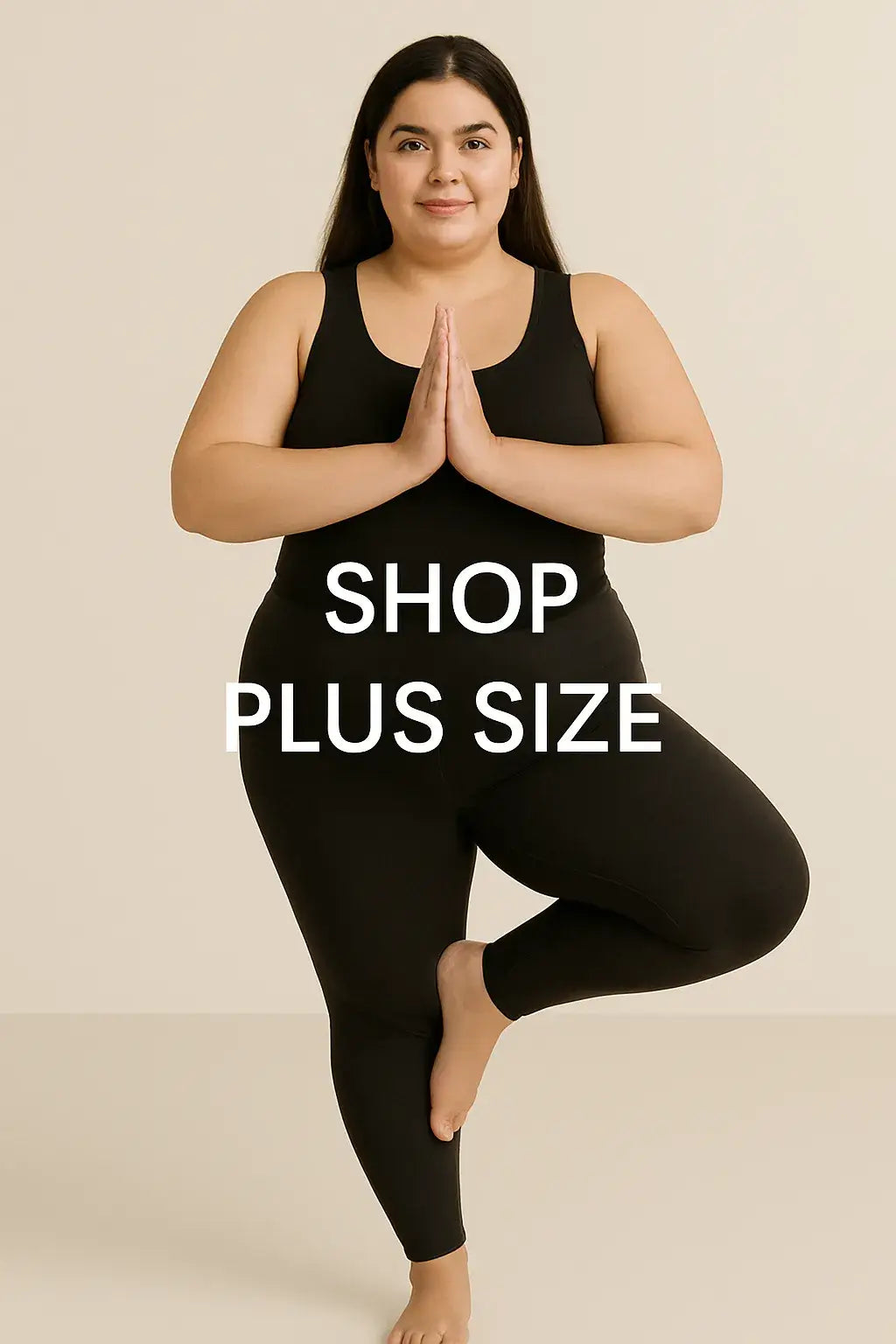 Plus size woman in activewear holding a yoga pose, highlighting comfort and confidence.