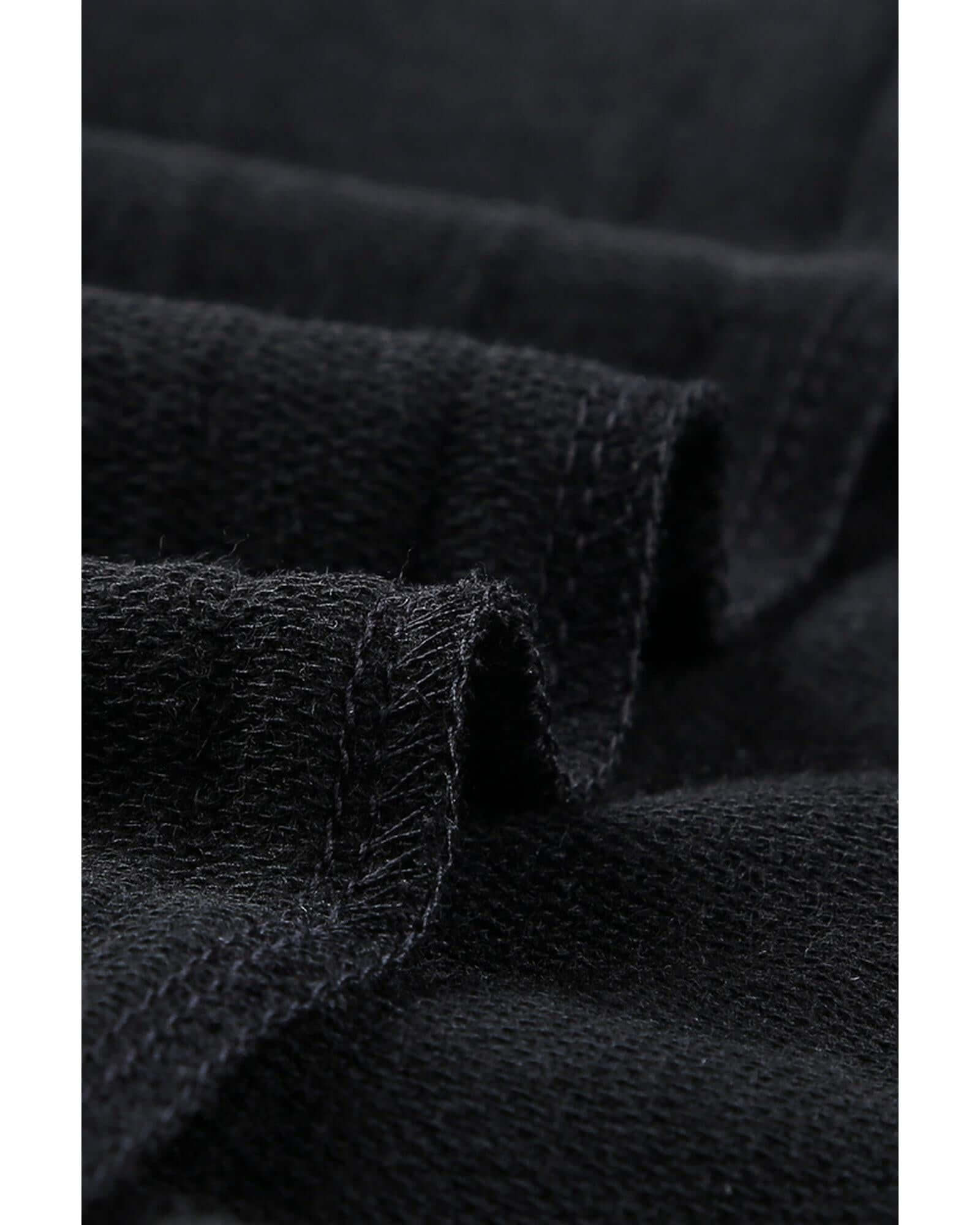 Close-up view of the soft, textured fabric of the Azura Exchange Black Sweatshirt, showcasing its premium quality for activewear.