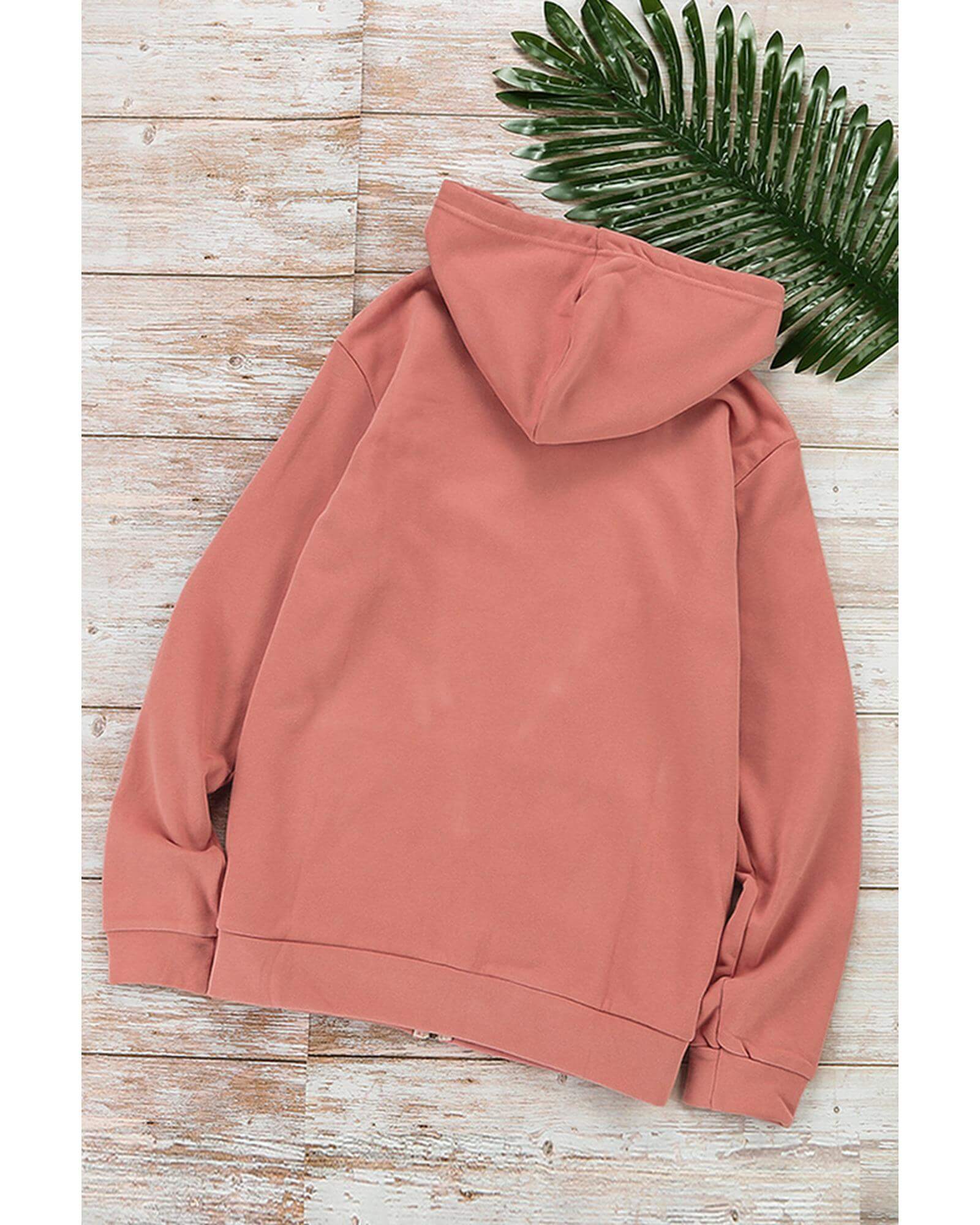 Back view of Azura Exchange Women's casual pink zip-up hoodie jacket on a wooden background.