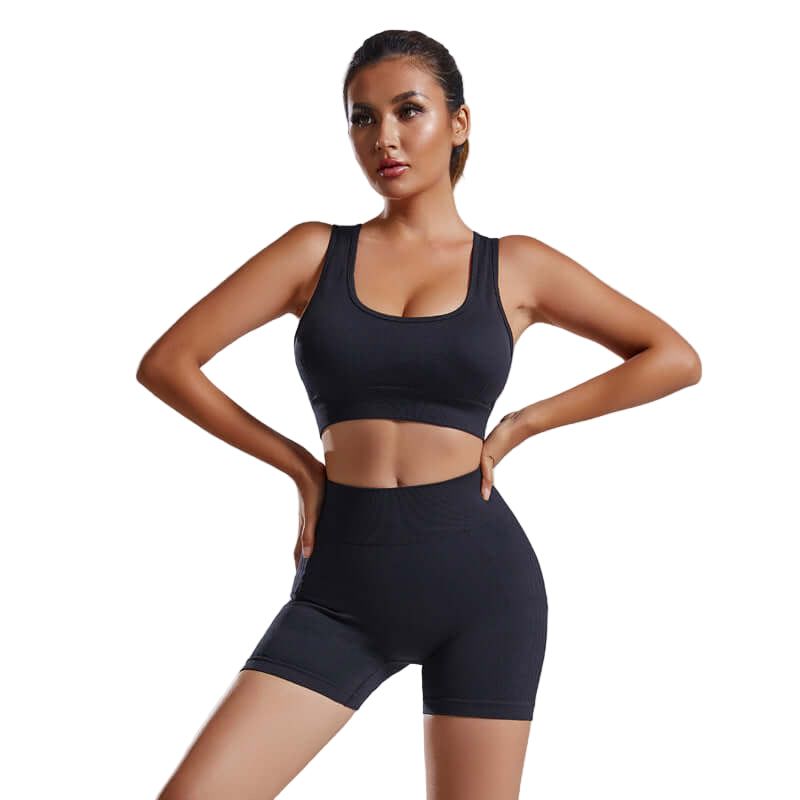 Women’s Activewear set in black, featuring a seamless sports vest and high-waist shorts for yoga and workouts.
