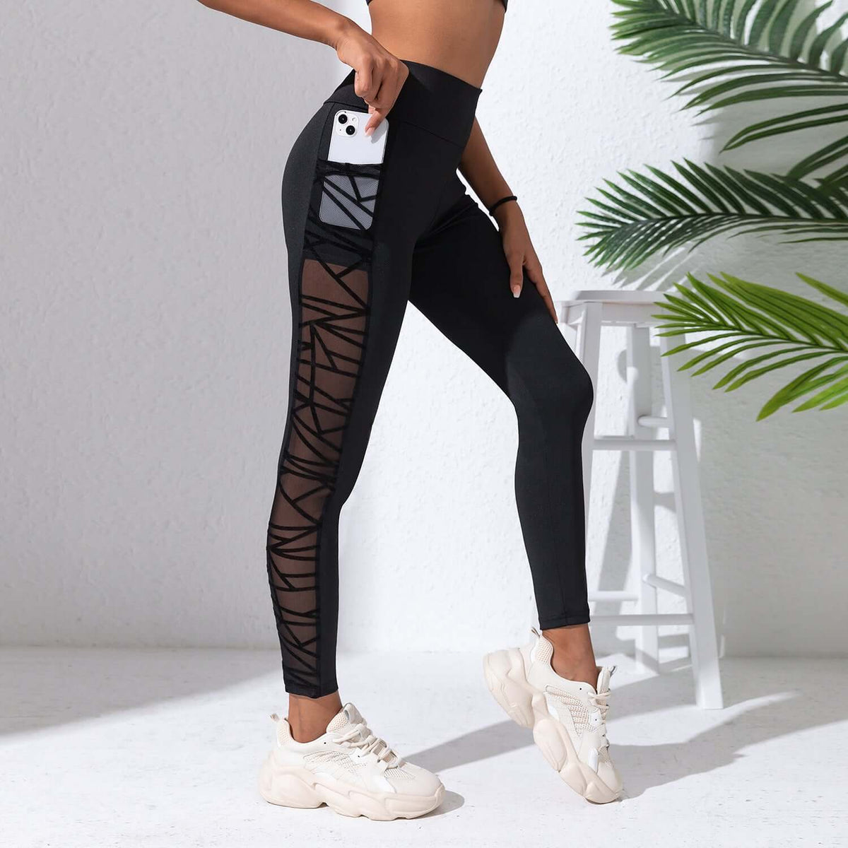 Black Plus Size Compression Leggings – Mesh, Sculpting Fit showcased on model with mesh features and high-waisted design.