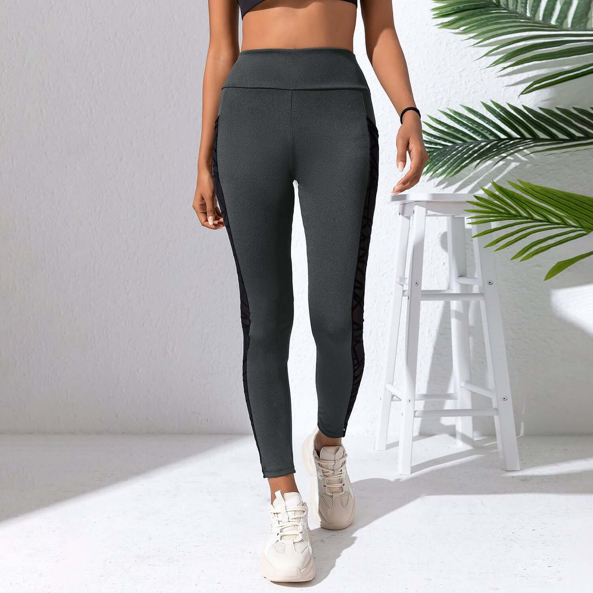Black Plus Size Compression Leggings – Mesh, Sculpting Fit on model, showcasing breathable comfort and supportive design.