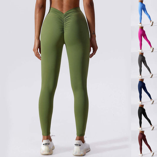 Back view of women's Peach Lift Yoga Leggings in green, showcasing hip-lifting design, perfect for activewear and workouts.