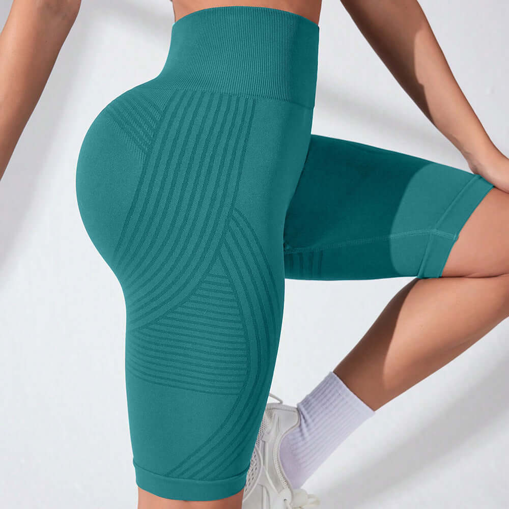 Seamless High-Waist Fifth Yoga Pants – Hip-Lifting Peach Fit in teal, showcasing hip-lifting design and high-compression waist.