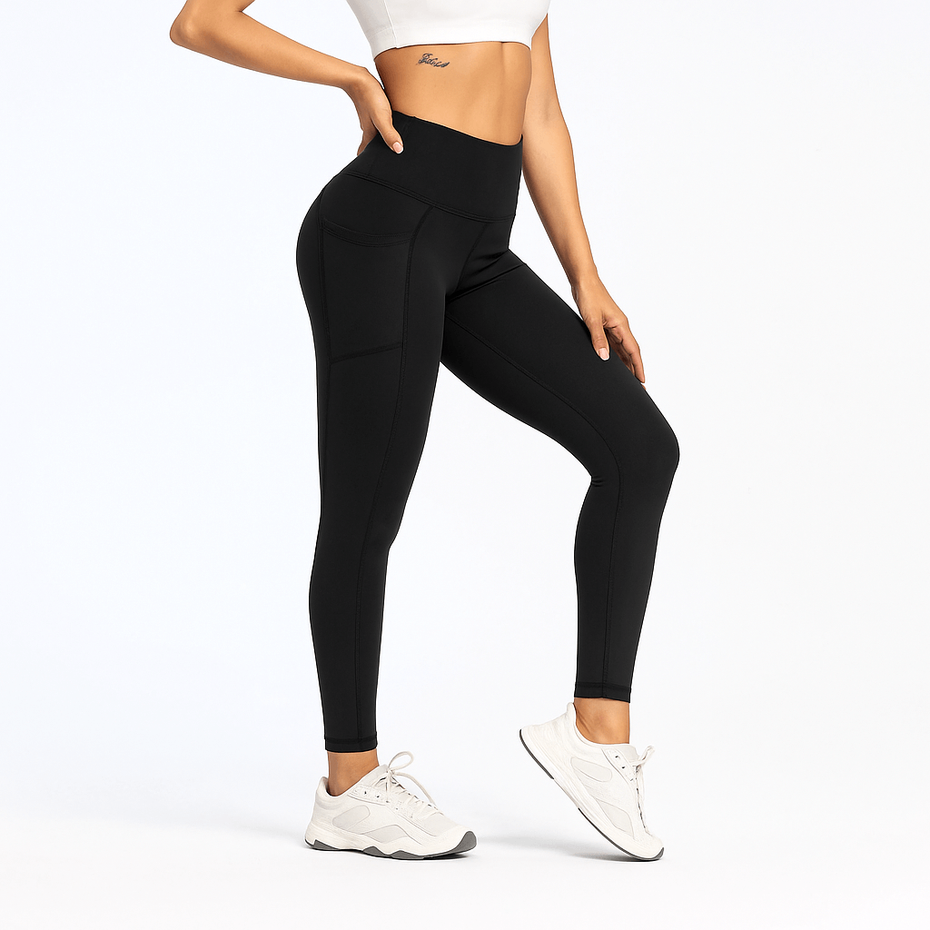 Black Slim-Fit Yoga Pants – High-Waisted with Pockets worn by a model showcasing style and comfort.