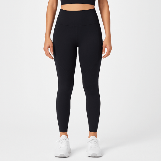 Black Contrast Yoga Pants – Sculpting, High-Waist Fit worn by model, showcasing a stylish, curvy silhouette.